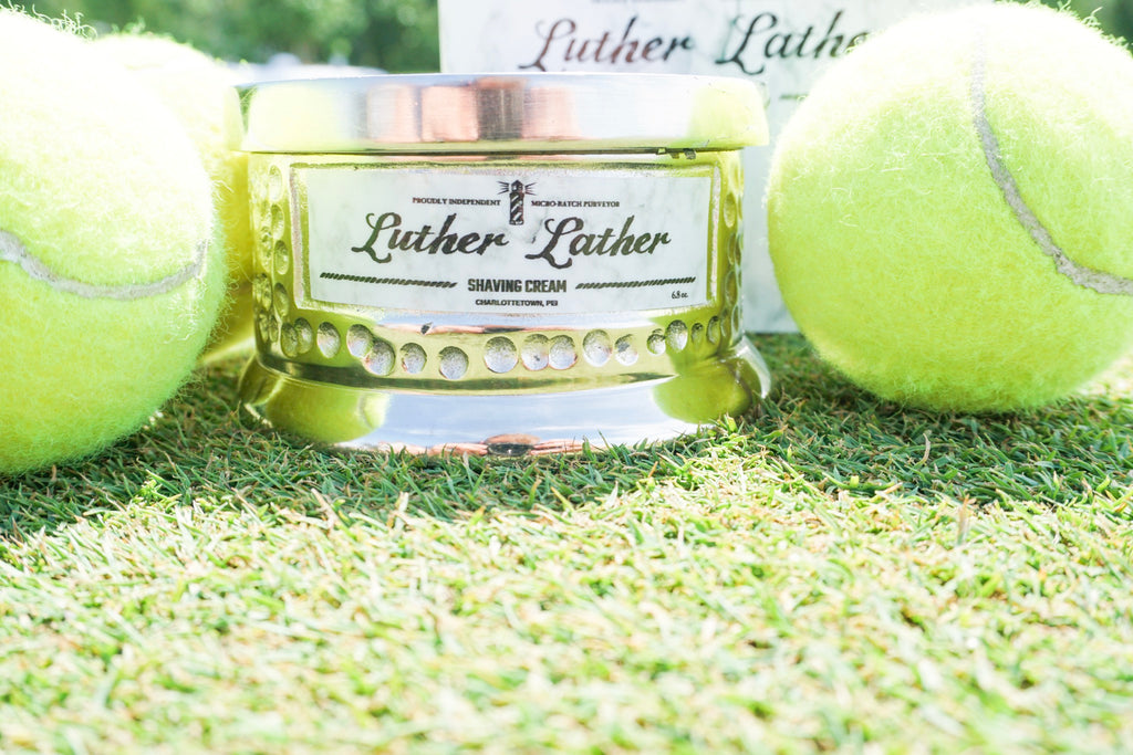 luther lather luxury shave cream on lawn tennis court